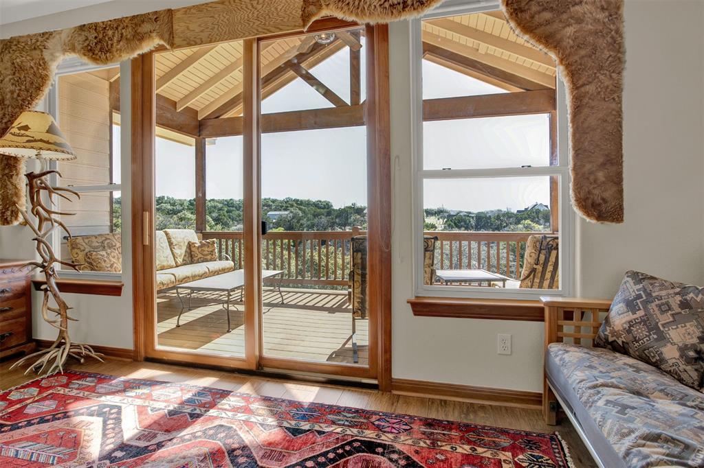 5255 Lookout Ridge Drive Marble Falls, TX 78654 - Photo 18 of 40 Upstairs den or study with outdoor covered balcony and scenic inspiring views