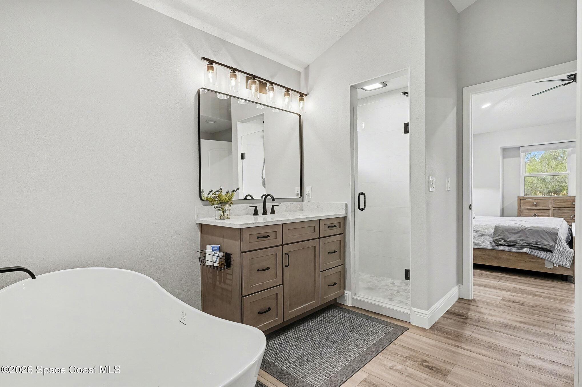 355 Lake View Lane Palm Bay, FL 32909 - Photo 21 of 49 a bathroom with a sink and a mirror