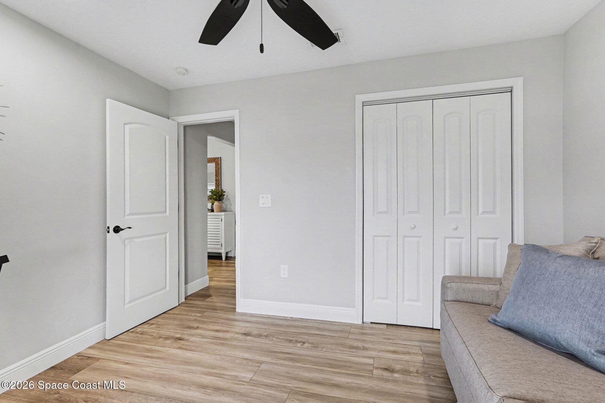 355 Lake View Lane Palm Bay, FL 32909 - Photo 25 of 49 a view of livingroom with furniture and ceiling fan