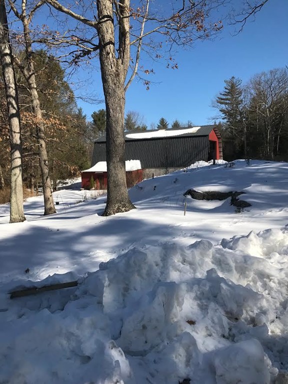 106 Paddock Road Rutland, MA 01543 - Photo 16 of 16 a front view of a house with a yard
