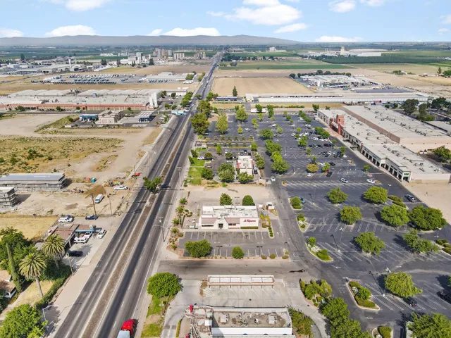 a view of a city with an ocean view