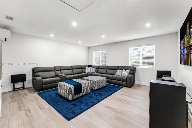 a spacious bathroom with a double vanity sink and a mirror
