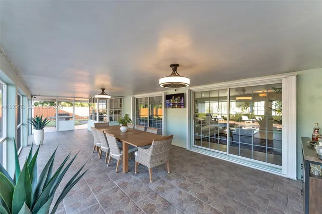 a view of a swimming pool with a patio