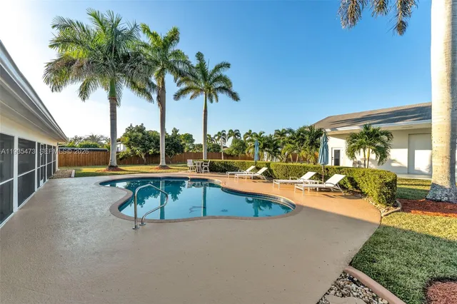 a view of a house with swimming pool