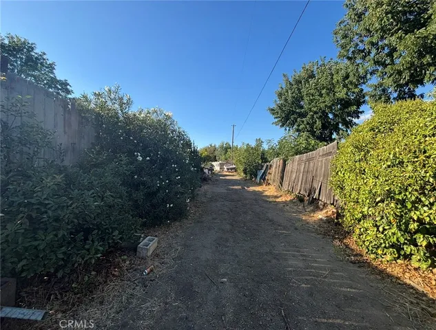 a view of a street with some trees