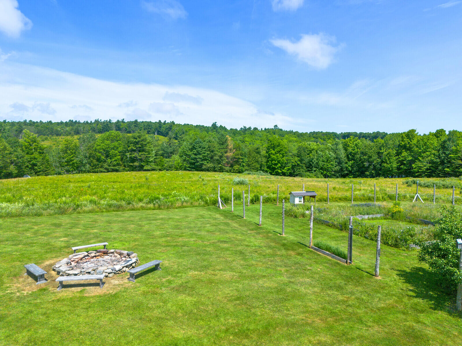 2140 Level Hill Road Palermo, ME 04354 - Photo 18 of 49 Large back yard with fire pit