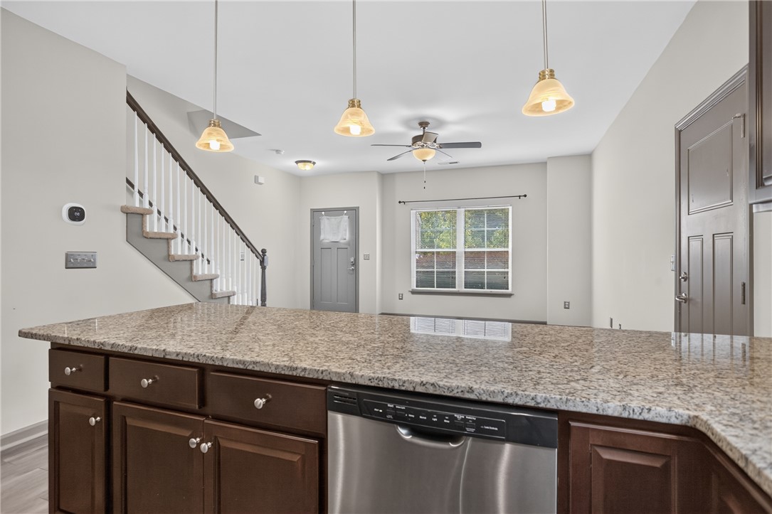 235 Pendleton Road, Unit K1 Clemson, SC 29631 - Photo 19 of 49 A contemporary open-concept layout unites the kitchen and living areas, offering clear sightlines and easy movement throughout the home.