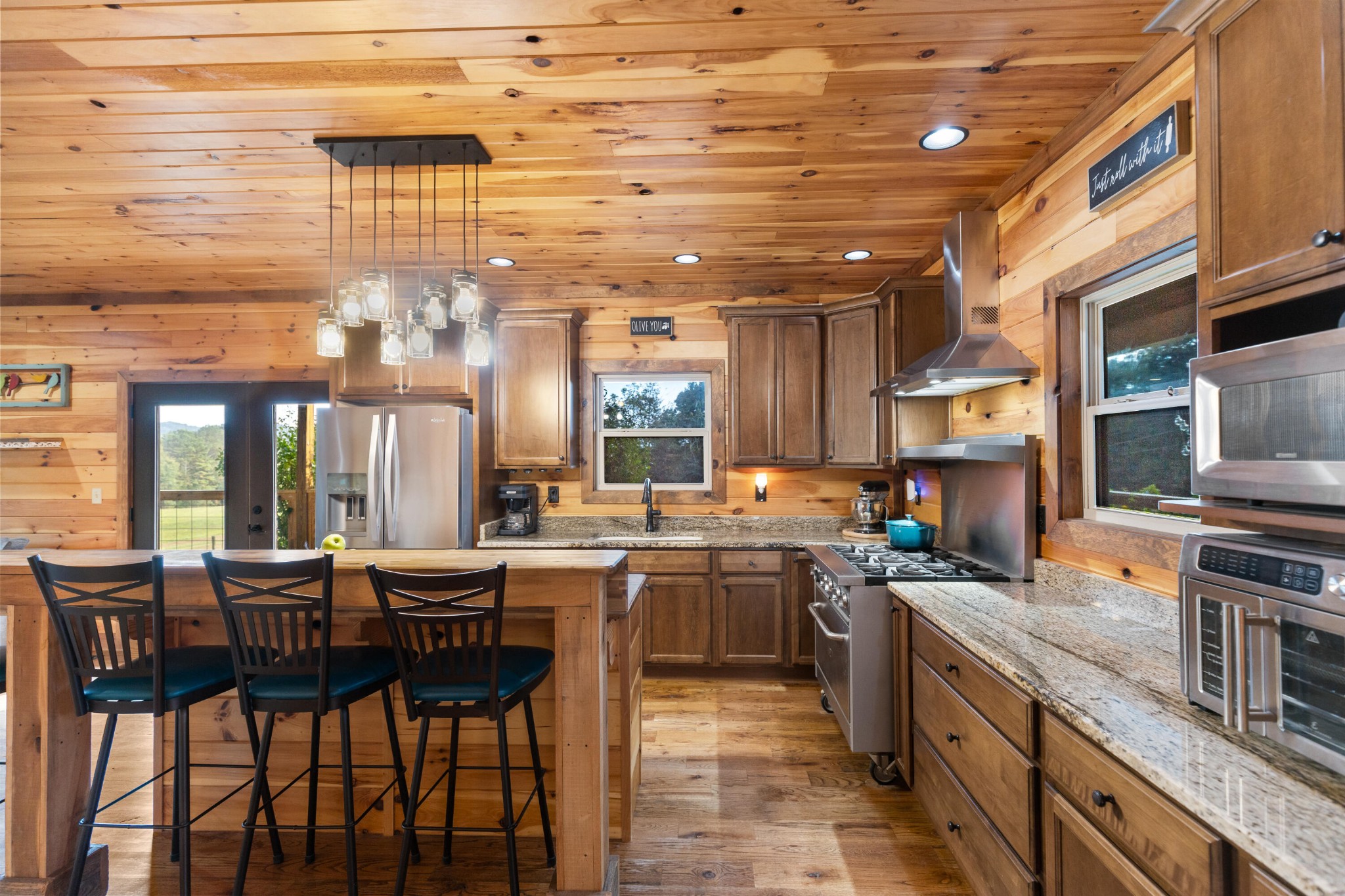 2054 Horns Creek Road Ocoee, TN 37361 - Photo 17 of 42 a large kitchen with a table and chairs