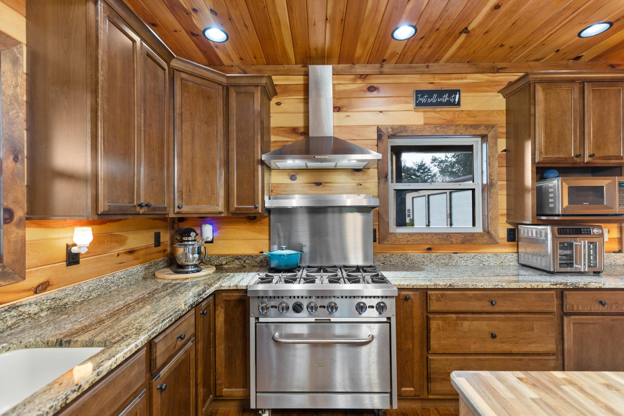 2054 Horns Creek Road Ocoee, TN 37361 - Photo 21 of 42 a kitchen with granite countertop a stove oven and cabinets