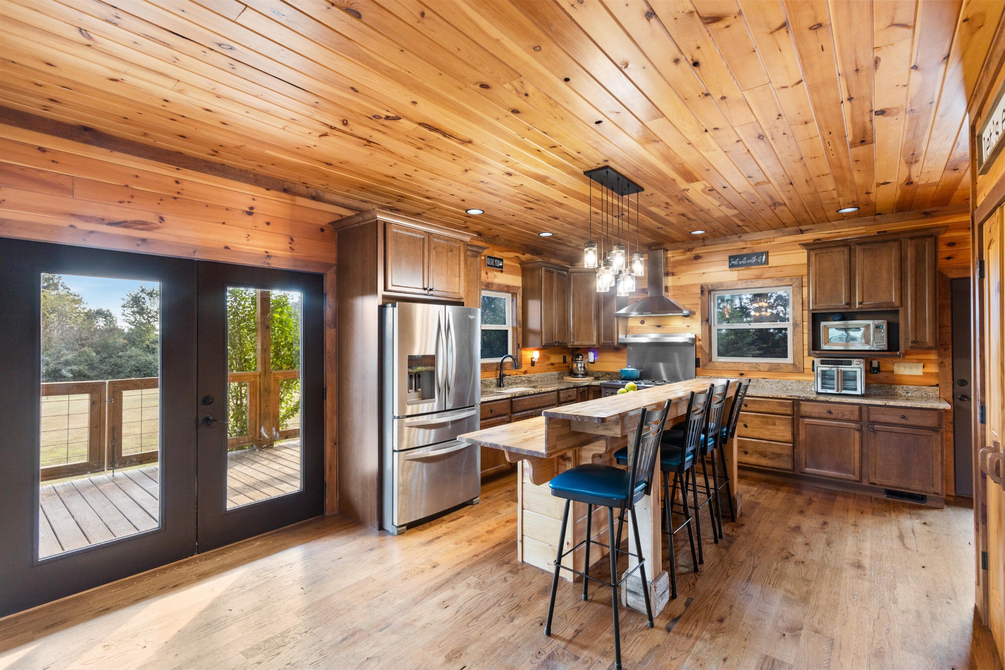 2054 Horns Creek Road Ocoee, TN 37361 - Photo 22 of 42 a dining room with furniture and a kitchen