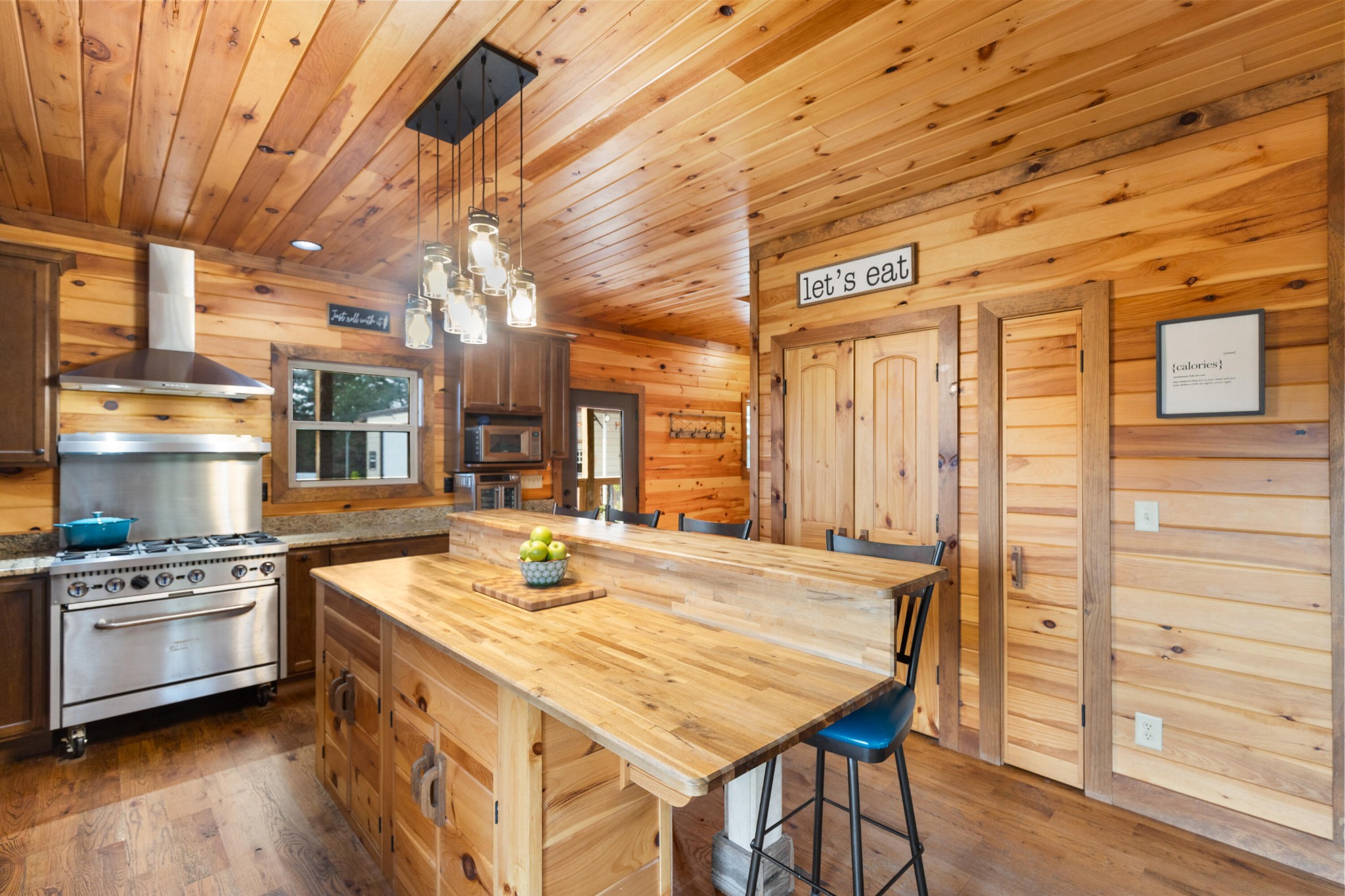 2054 Horns Creek Road Ocoee, TN 37361 - Photo 23 of 42 a kitchen with a stove a sink and a refrigerator