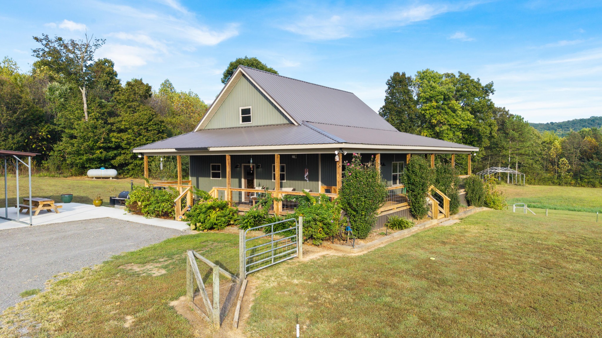 2054 Horns Creek Road Ocoee, TN 37361 - Photo 3 of 42 a front view of a house with a porch