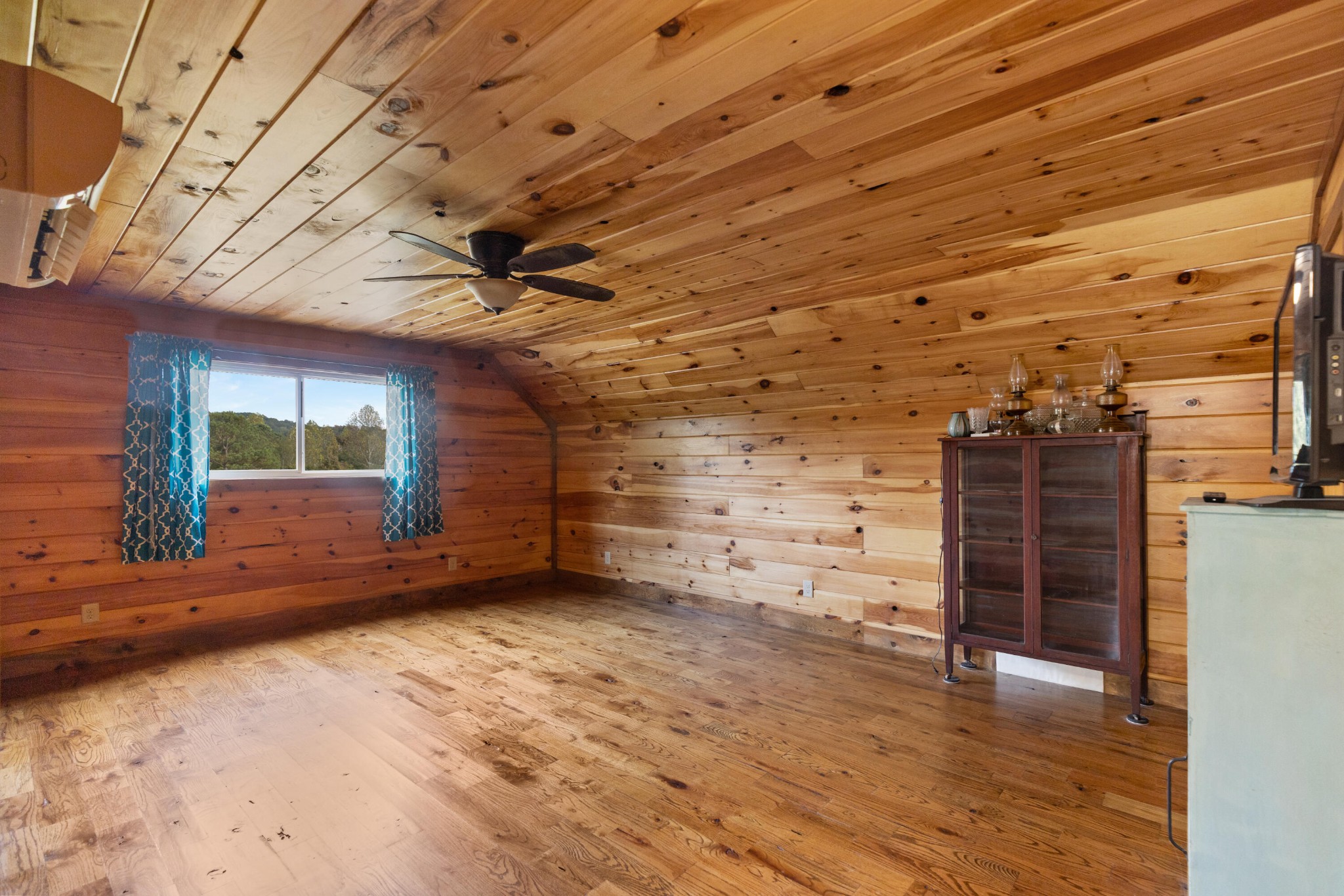 2054 Horns Creek Road Ocoee, TN 37361 - Photo 32 of 42 a view of a room with wooden walls