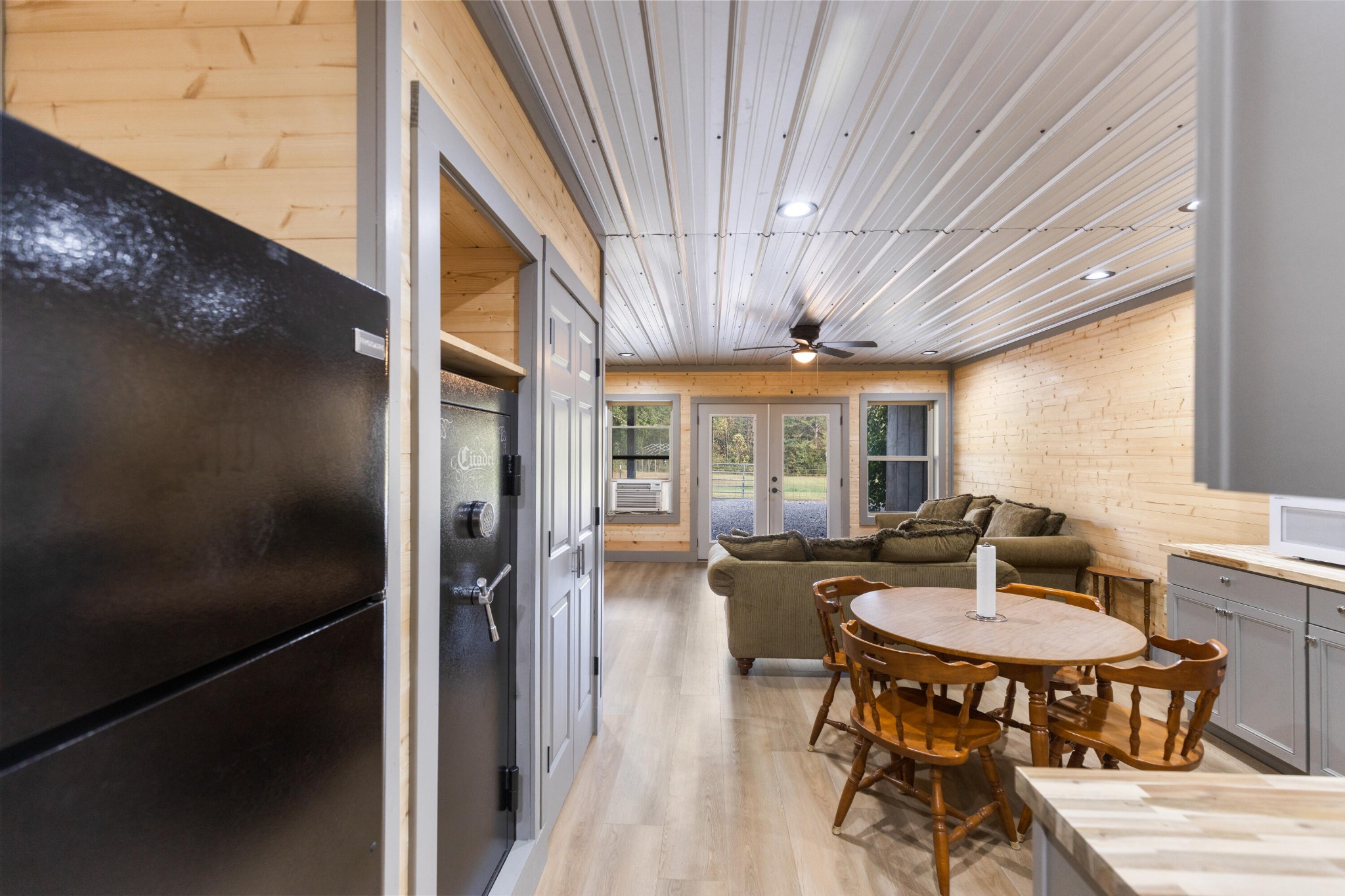 2054 Horns Creek Road Ocoee, TN 37361 - Photo 35 of 42 a view of a dining room with furniture window and wooden floor
