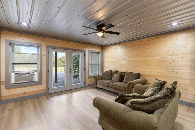 a bedroom with a bed and a walk in closet