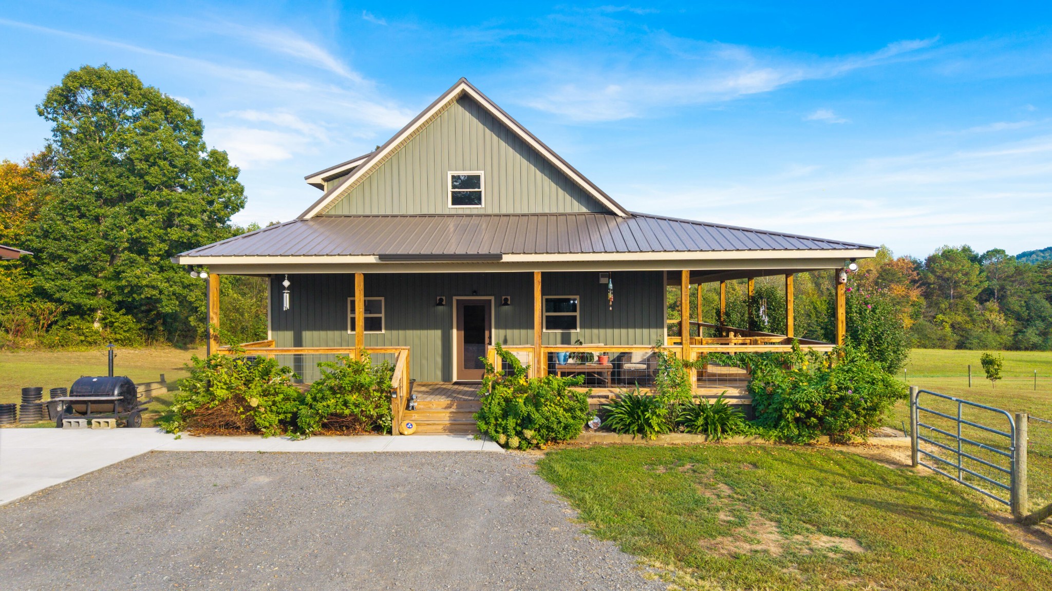 2054 Horns Creek Road Ocoee, TN 37361 - Photo 4 of 42 a front view of a house with garden