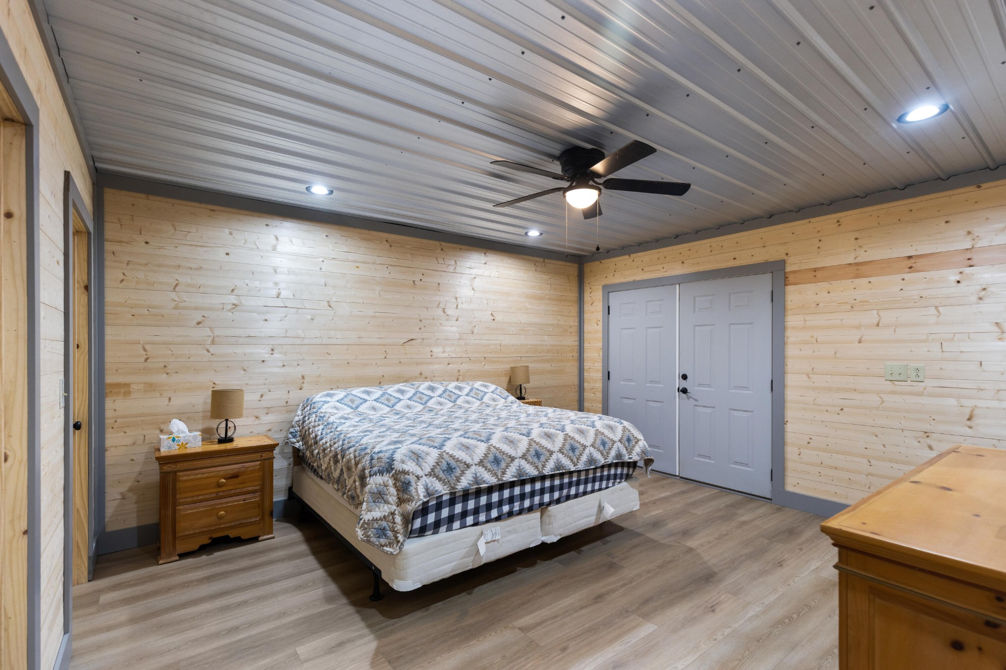 2054 Horns Creek Road Ocoee, TN 37361 - Photo 42 of 42 a bedroom with a bed and a walk in closet