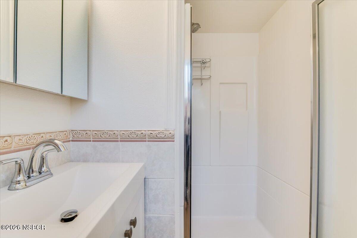 321 North Z Street Lompoc, CA 93436 - Photo 24 of 33 a bathroom with a sink and a tub