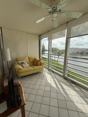 a living room with a large window