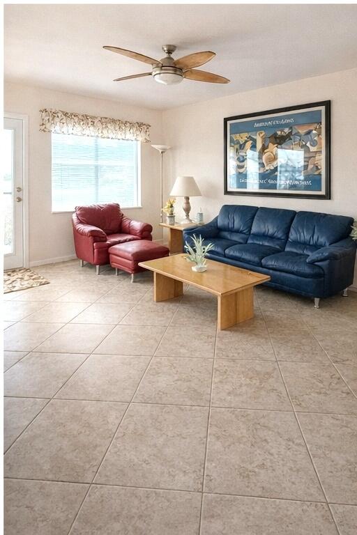 4032 Yarmouth C Boca Raton, FL 33434 - Photo 2 of 14 a living room with furniture and a large window