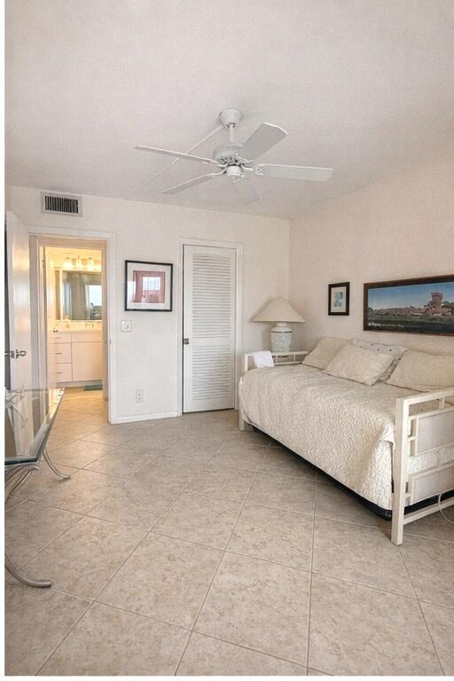 4032 Yarmouth C Boca Raton, FL 33434 - Photo 6 of 14 a bedroom with a bed and closet