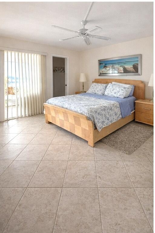 4032 Yarmouth C Boca Raton, FL 33434 - Photo 8 of 14 a bedroom with a bed and a dresser