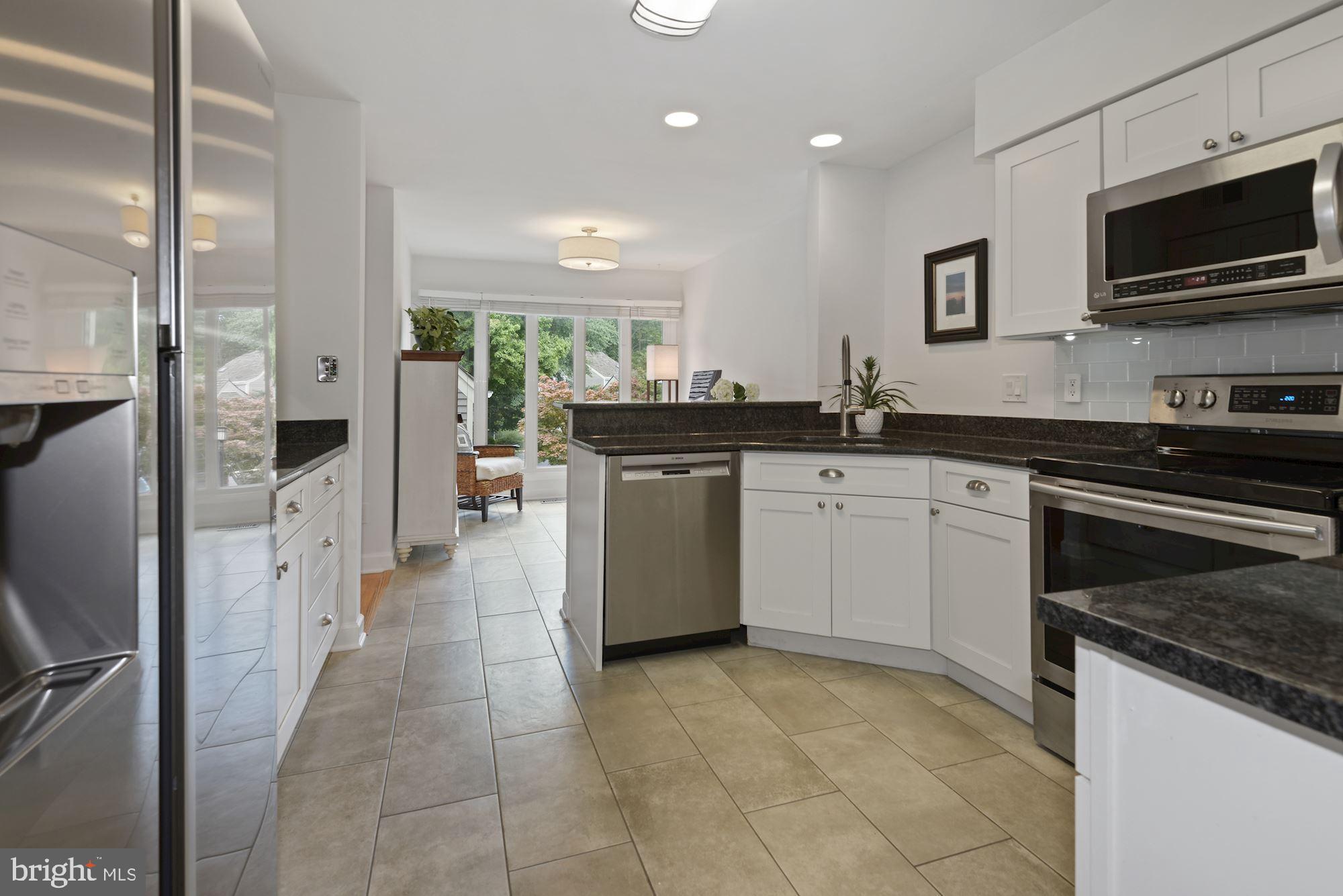 11633 Chapel Cross Way Reston, VA 20194 - Photo 11 of 64 Granite counters and stainless appliances