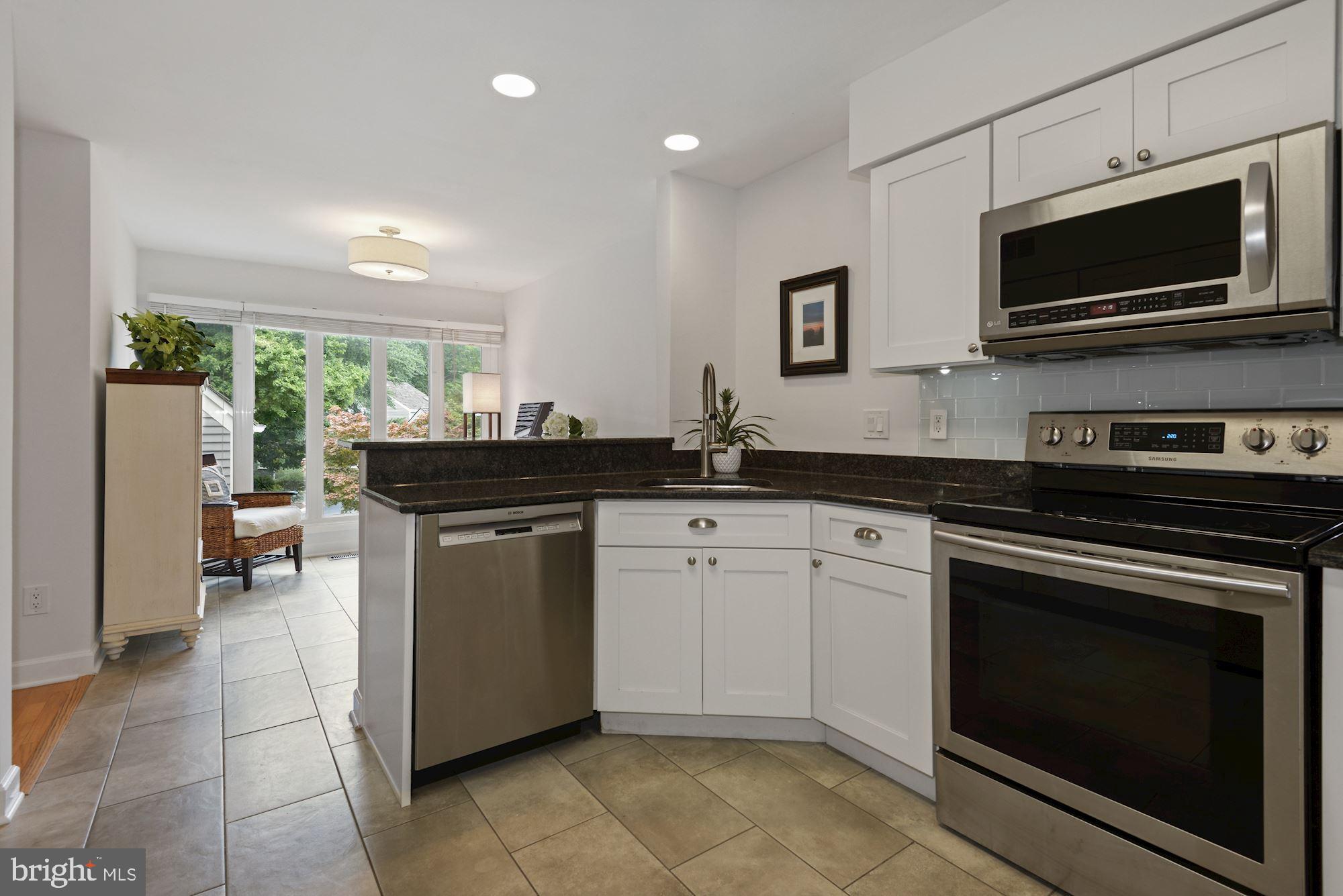 11633 Chapel Cross Way Reston, VA 20194 - Photo 12 of 64 Kitchen is open to an eat-in breakfast room