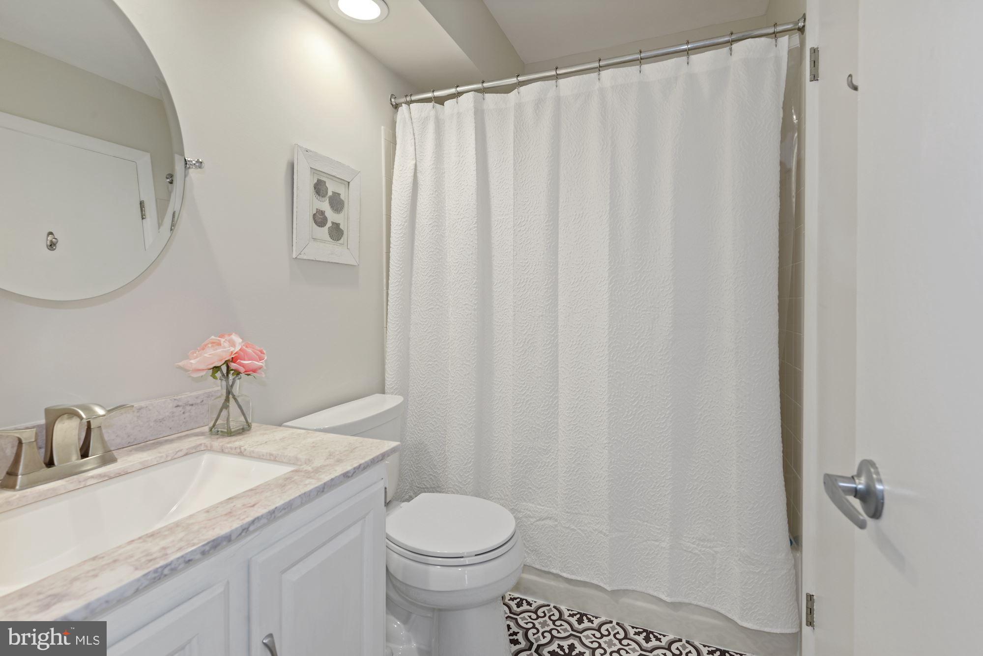 11633 Chapel Cross Way Reston, VA 20194 - Photo 22 of 64 Full bath on main level