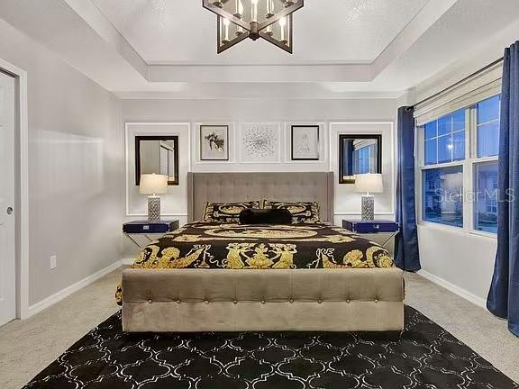 1919 Tropical Palms Circle Kissimmee, FL 34747 - Photo 16 of 41 a living room with a couch