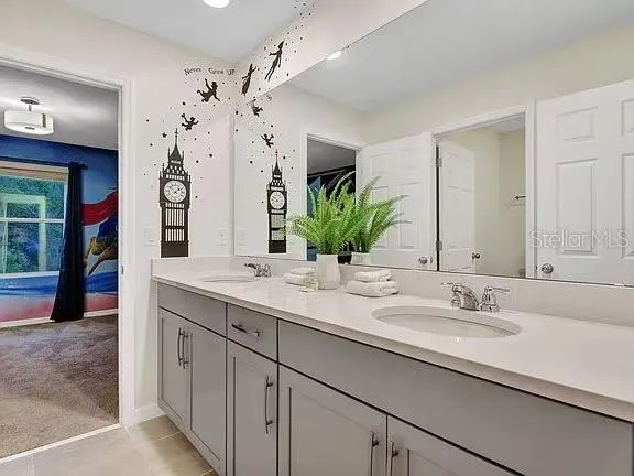 a living room with furniture pool table and a window