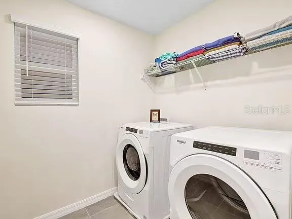 a living room with hard wood floor