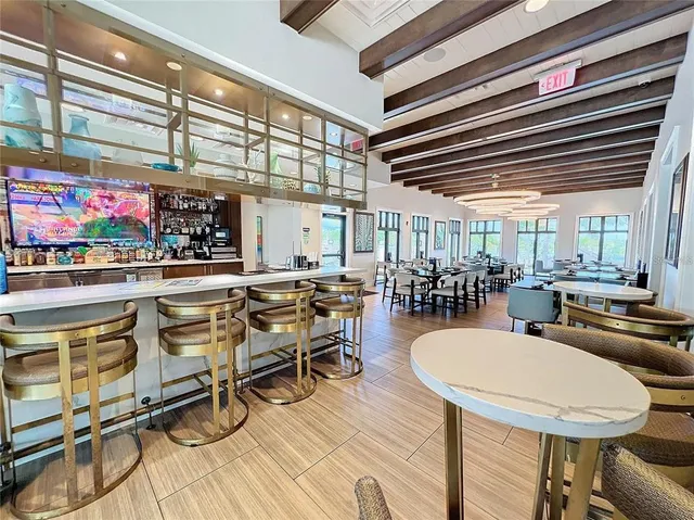 a view of outdoor space with swimming pool and furniture