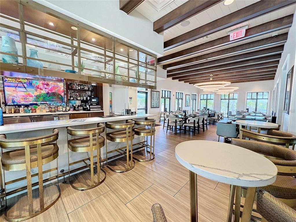 1919 Tropical Palms Circle Kissimmee, FL 34747 - Photo 34 of 41 a outdoor patio with a table and chairs