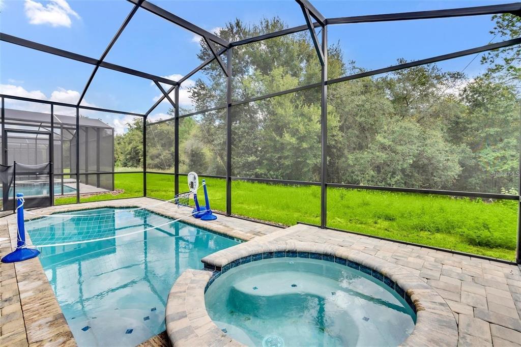 1919 Tropical Palms Circle Kissimmee, FL 34747 - Photo 40 of 41 a small yard with glass top table and chairs