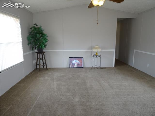 3405 Sinton Road, Unit 233 Colorado Springs, CO 80907 - Photo 6 of 22 Living room; newer carpet & just cleaned; also just painted
