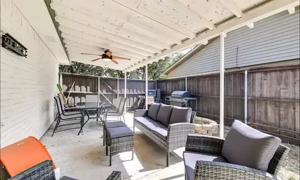 a bathroom with a sink a mirror and a toilet