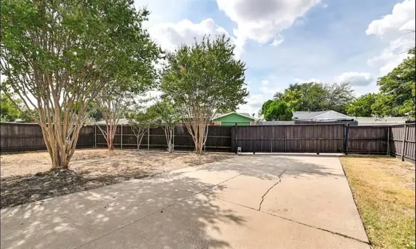 a outdoor space with patio the couches and a potted plant