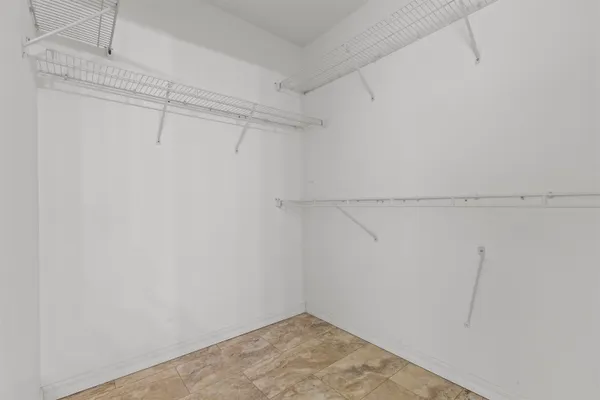 a view of a room with racks on the wall