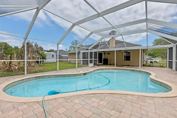 a view of a house with a swimming pool