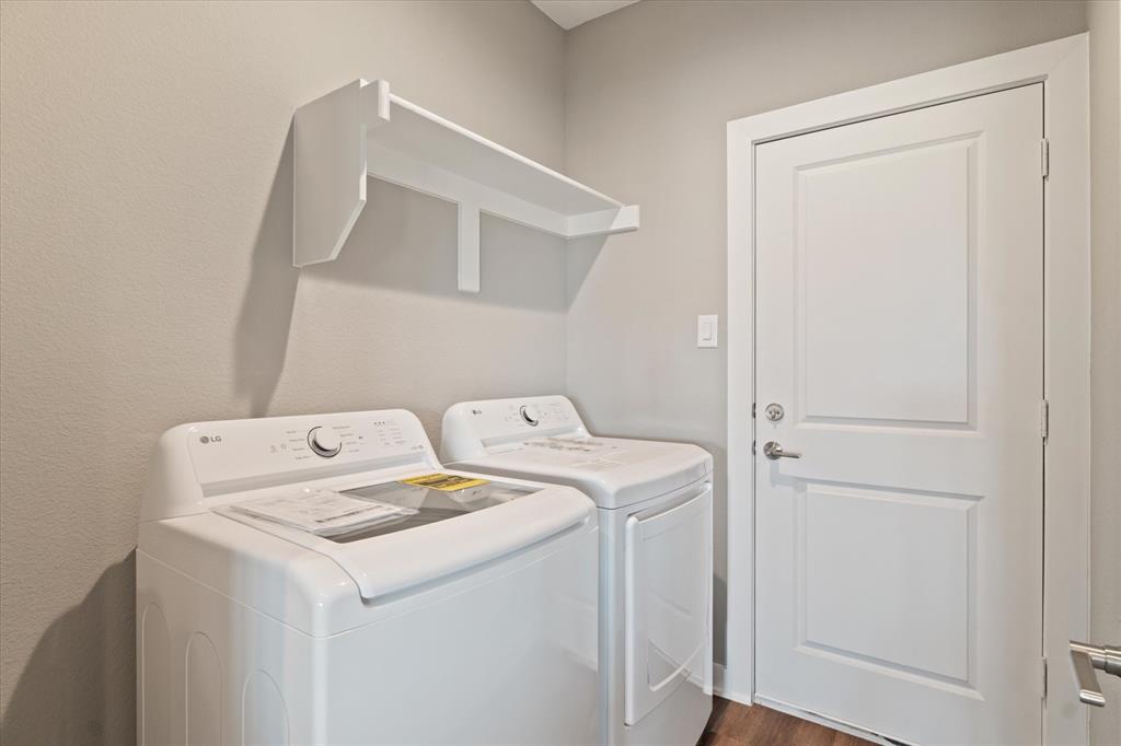 434 Cirrus Circle Muenster, TX 76252 - Photo 13 of 29 a utility room with dryer and washer
