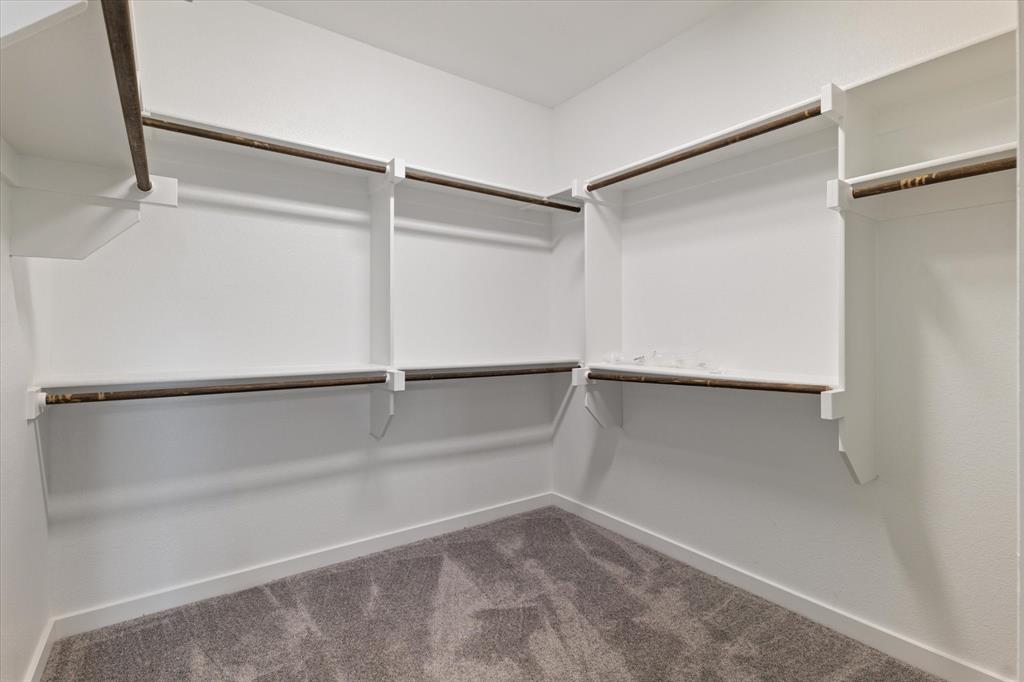 434 Cirrus Circle Muenster, TX 76252 - Photo 19 of 29 a view of an empty walk in closet