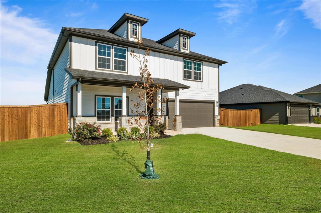 434 Cirrus Circle Muenster, TX 76252 - Photo 2 of 29 a front view of a house with a yard