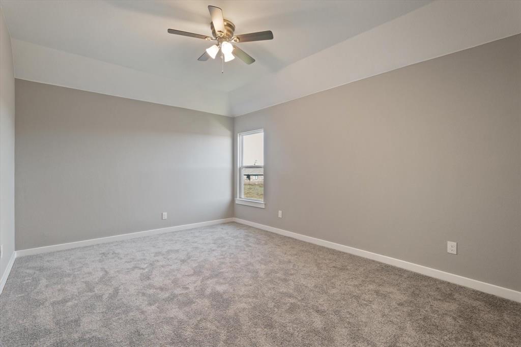 434 Cirrus Circle Muenster, TX 76252 - Photo 21 of 29 a view of an empty room with a fan
