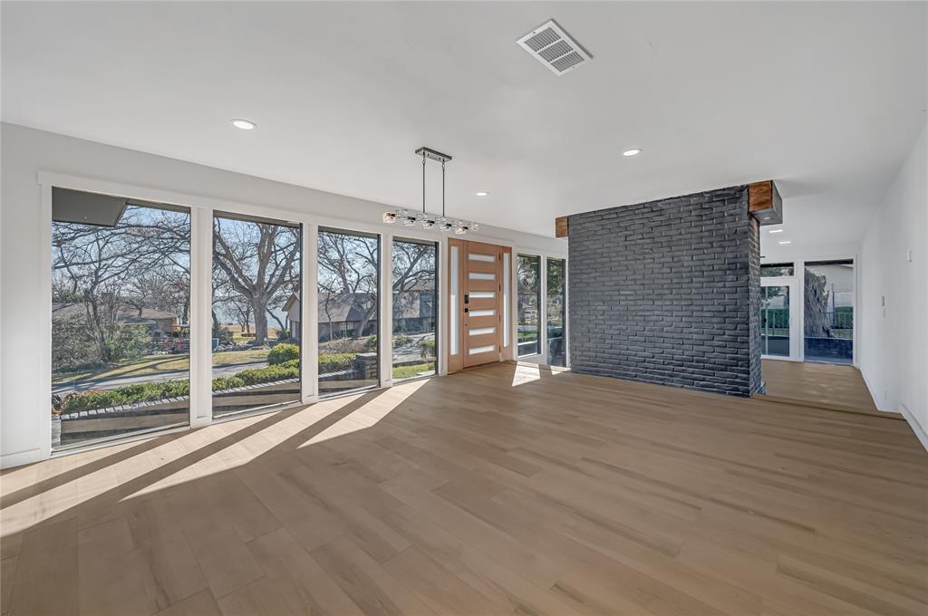 109 Pecan Drive Rowlett, TX 75087 - Photo 11 of 39 a view of an empty room with a balcony
