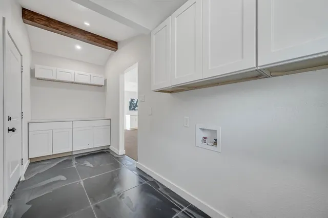 a view of a hallway with closet