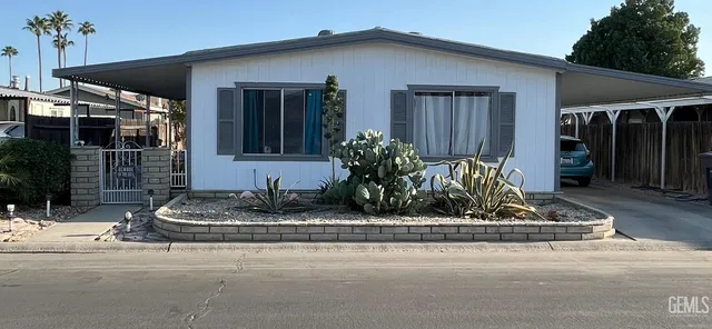 a front view of house with garage