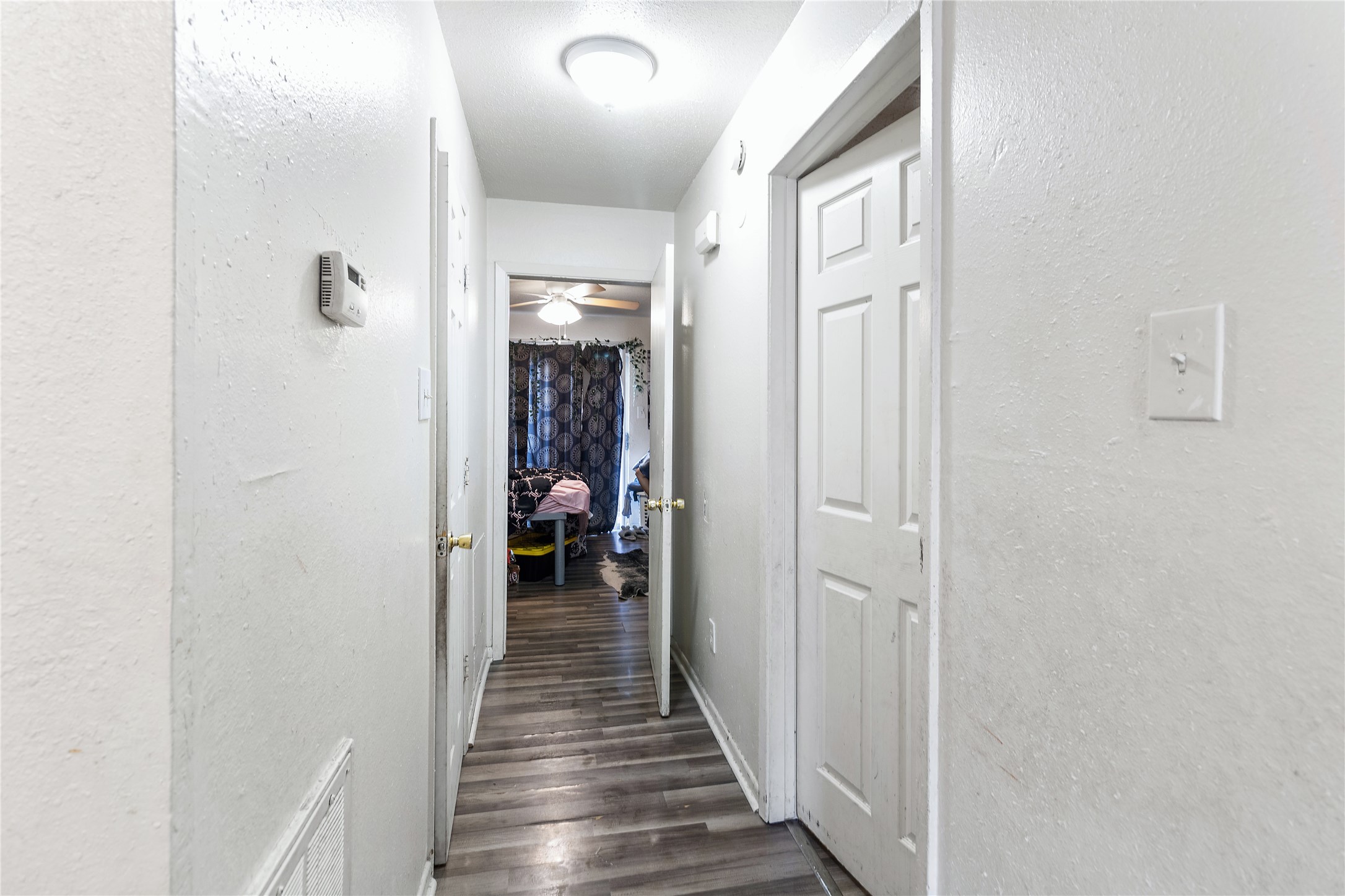 4125 Old Hearne Road Bryan, TX 77803 - Photo 15 of 21 a view of a hallway with a livingroom