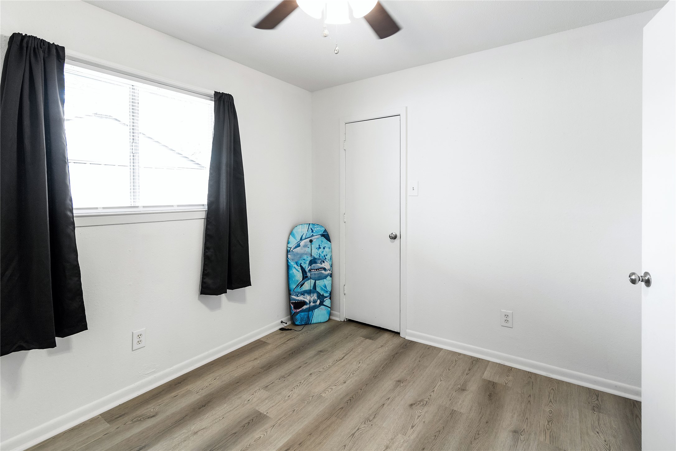 4125 Old Hearne Road Bryan, TX 77803 - Photo 7 of 21 a view of an empty room with a window