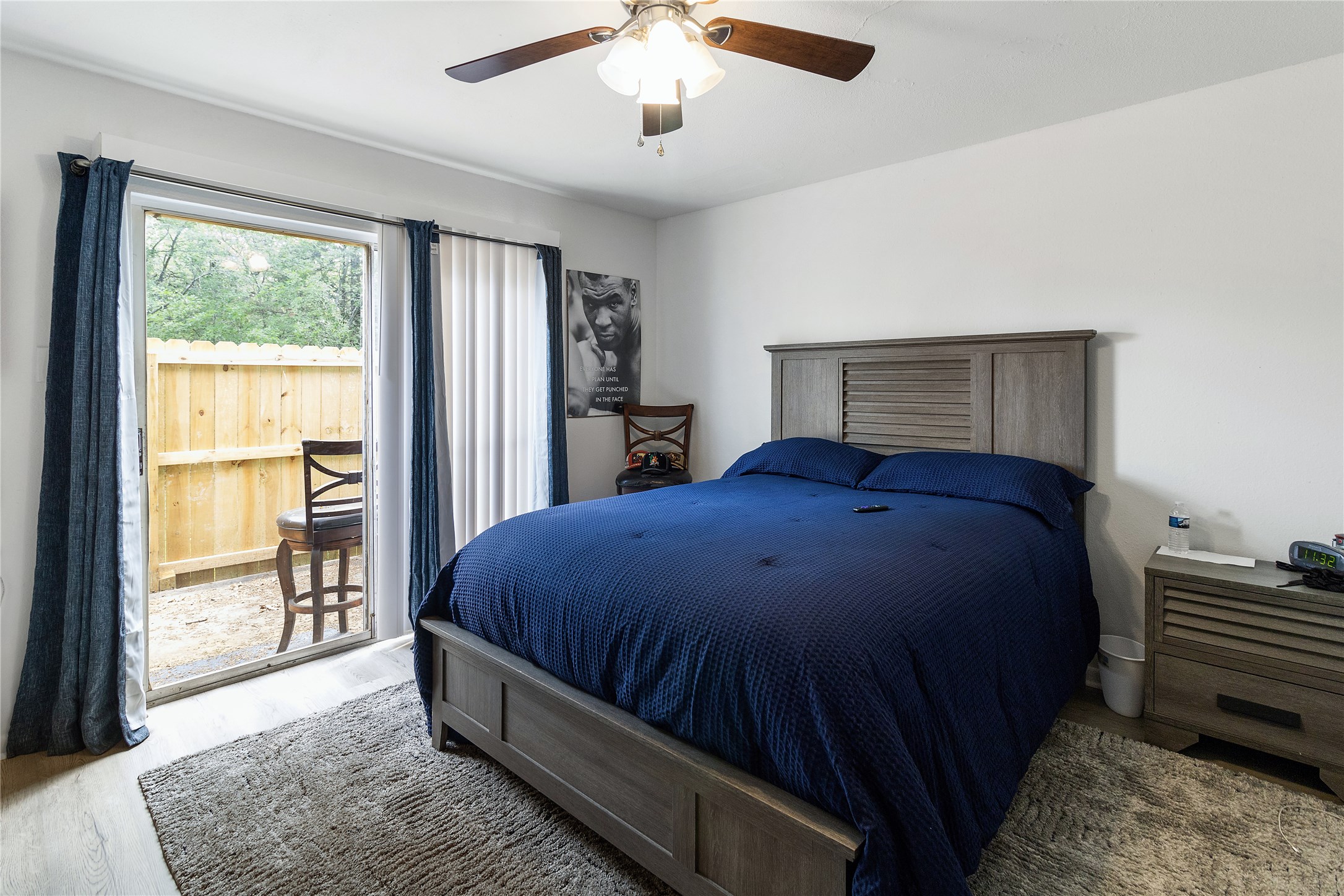 4125 Old Hearne Road Bryan, TX 77803 - Photo 9 of 21 a bed sitting in a spacious bedroom next to a window